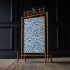 French Giltwood Faux Bamboo Fire Screen with Ikat panel. Circa 1900-1920